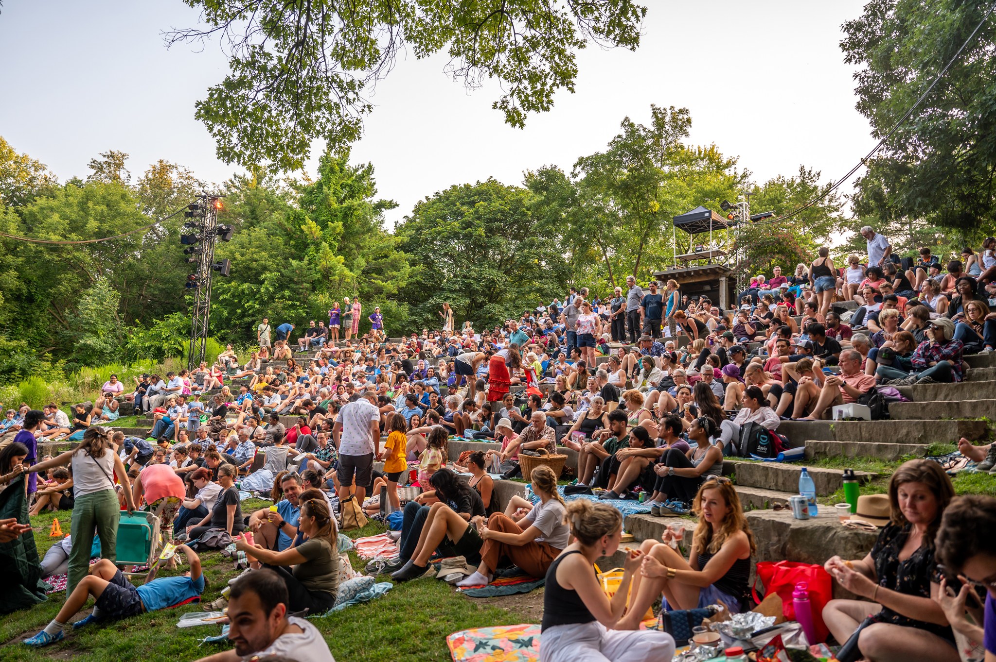 Photo of crowd looking at theatre performance in High Park
